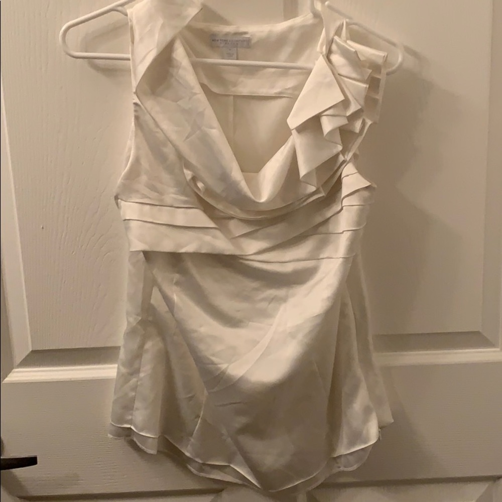 White ruffle blouse